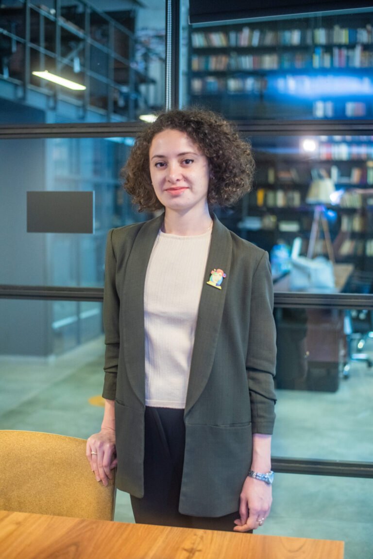 Three women talking and laughing